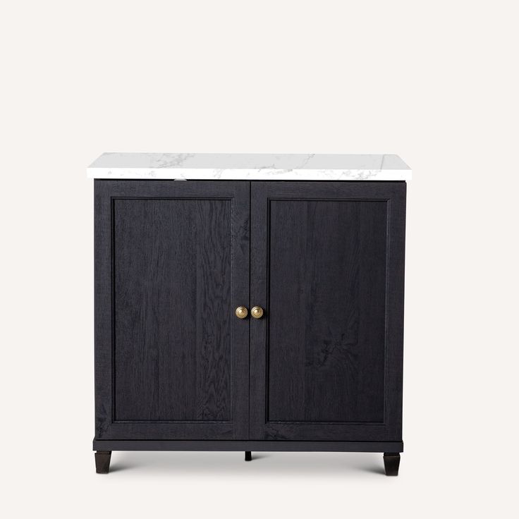 a black cabinet with two doors and a marble top on it's legs, against a white background