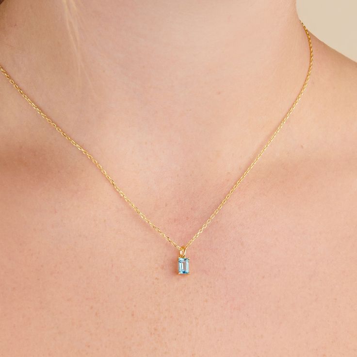 A dainty stone and delicate metallic chain are combined to create this Gold Pendant Necklace in bright blue topaz, your new favorite wear-anywhere accessory.   The birthstone for the month of December is Blue Topaz. This bright light blue gemstone brings energy to the wearer and symbolizes creativity.  Authentic natural blue topaz stone; Made of 14K gold plated sterling silver.   Hypoallergenic, nickel, and lead-free; Tarnish resistant. H2O sensitive. Recommend taking it off before taking shower. Light Blue Gemstone, December Birthstone Necklace, September Birthstone Jewelry, August Birthstone Jewelry, July Birthstone Jewelry, Blue Topaz Stone, Zodiac Jewelry, Jewelry Ring Box, Pearl Jewellery Earrings