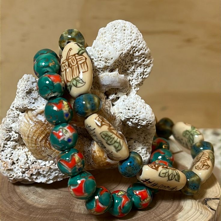 Nwot ~ Artisan Ceramic Beaded Bracelets ~ Stretch 2 ~ Artisan Bohemian Ceramic Bracelets Green/Beige/Red/Blue Approximately: 6”~ 6.5” Each Stretch Cording New And Never Worn Vintage And Preowned Items Often Have Wear And Tear From Normal Use, Improper Storage Or Care. All Items Are Presented To The Best Of My Ability And Knowledge. Please Feel Free To Reach Out With Questions Or Clarification You Might Have On An Item Prior To Purchasing. Please Manage Your Expectations When Bidding Or Purchasing, All Sales Are Binding Per Poshmark Policies. All Items Are "As Is" And Not Returnable. Thanks For Stopping By, Enjoy! Symbolic Multicolor Festival Jewelry, Symbolic Multicolor Beaded Jewelry, Handmade Symbolic Multicolor Jewelry, Symbolic Multicolor Round Beads Jewelry, Bohemian Beads For Festivals And Gifts, Handmade Symbolic Beaded Bangle Bracelets, Handmade Symbolic Beaded Bangle Bracelet, Symbolic Handmade Bracelets For Festivals, Artisan Wooden Beads Bracelets For Meditation