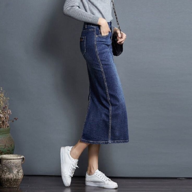 Introducing our Women's Denim Long Jeans Skirts, perfect for adding a touch of effortless style to your everyday wardrobe. Made with high-quality denim fabric, these skirts offer durability and comfort, while still being fashionable. Here are some features and benefits to keep in mind: High-quality denim material: Our skirts are made with top-of-the-line denim fabric, which is known for its durability and longevity. This means you can wear them for years to come without worrying about them weari High Waist Stretch Denim Skirt In Denim Blue, Medium Wash Knee-length Denim Skirt For Fall, Fall Denim Skirt In Denim Blue, Blue Non-stretch Mid-rise Skirt, Non-stretch Mid-rise Blue Skirt, Non-stretch Mid-rise Denim Blue Skirt, Stretch Denim Skirt In Denim Blue, Stretch Denim Skirt With Pockets, Fall Denim Stretch Skirt