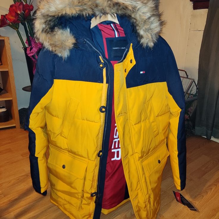 New With Tags!! Men's Tommy Hilfiger Yen Winter Coat, Size L, Faux Fur Hood, Wind Resistant, Ultra Lift (A Down Alternative). Yellow Winter Outerwear For Cold Weather, Tommy Hilfiger Hooded Windbreaker For Fall, Hooded Yellow Parka For Winter, Yellow Hooded Parka For Winter, Tommy Hilfiger Casual Hooded Windbreaker, Yellow Hooded Winter Parka, Yellow Winter Parka With Pockets, Winter Tommy Hilfiger Outerwear With Pockets, Hooded Yellow Winter Parka