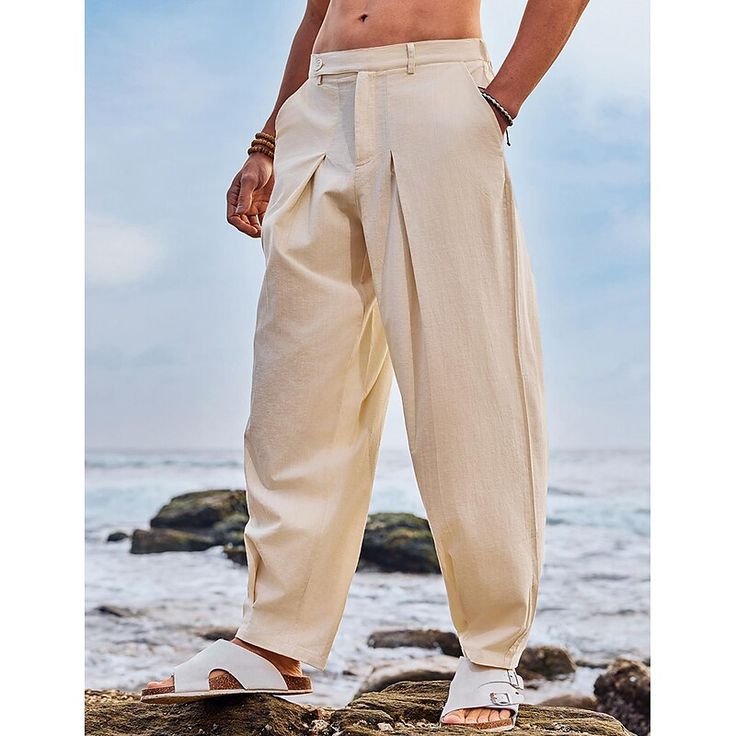 Season:Spring   Fall,Summer; Fabric:100% Cotton; Gender:Men's; Style:Fashion,Streetwear; Elasticity:Inelastic; Occasion:Holiday,Daily; Fit Type:Regular Fit; Function:Breathable,Comfort; Waistline:Mid Waist; Pattern:Solid Color; Design:Pocket,Pleats; Brand:OUKU; Pants Type:Trousers,Tapered Carrot Pants,Beach Pants,Summer Pants; Fly Type:Zipper,Button; Front page:FF; Listing Date:03/27/2024; Pants Length:Full Length Casual Baggy Wide Leg Pants For Summer, Baggy Bottoms With Elastic Waistband For Vacation, Baggy Summer Bottoms For Beach, Beach Ankle Pants With Pockets, Beach Ankle-length Pants With Pockets, Straight Leg Solid Color Beach Bottoms, Straight Leg Beach Bottoms In Solid Color, Baggy Bottoms For Vacation, Beach Straight Leg Bottoms Solid Color