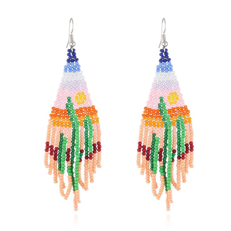 PRICES MAY VARY. 🌈Bohemian Beaded Dangle Earrings: Long beaded statement tassel earrings with cactus pattern, nature seed bead earrings add ease, freedom and enthusiasm to your look. 🌈Size of Tassel Drop Earrings: Long beaded fringe earrings are made of high quality seed beads, each bead is carefully selected and threaded, mini statement bohemian earrings length: 4.7 inch, width: 1.5 inch. 🌈Various Colors to Match Your Clothes: Handmade beaded tassel earrings are compatible with everything in Summer Chandelier Earrings With Dangling Beads, Beaded Tassel Earrings For Beach, Summer Chandelier Dangle Earrings With Dangling Beads, Summer Beach Tassel Earrings With Dangling Beads, Summer Chandelier Dangle Earrings With Beads, Summer Chandelier Dangling Bead Earrings, Summer Bohemian Dangle Tassel Earrings, Bohemian Summer Dangle Tassel Earrings, Summer Beach Jewelry With Beaded Fringe