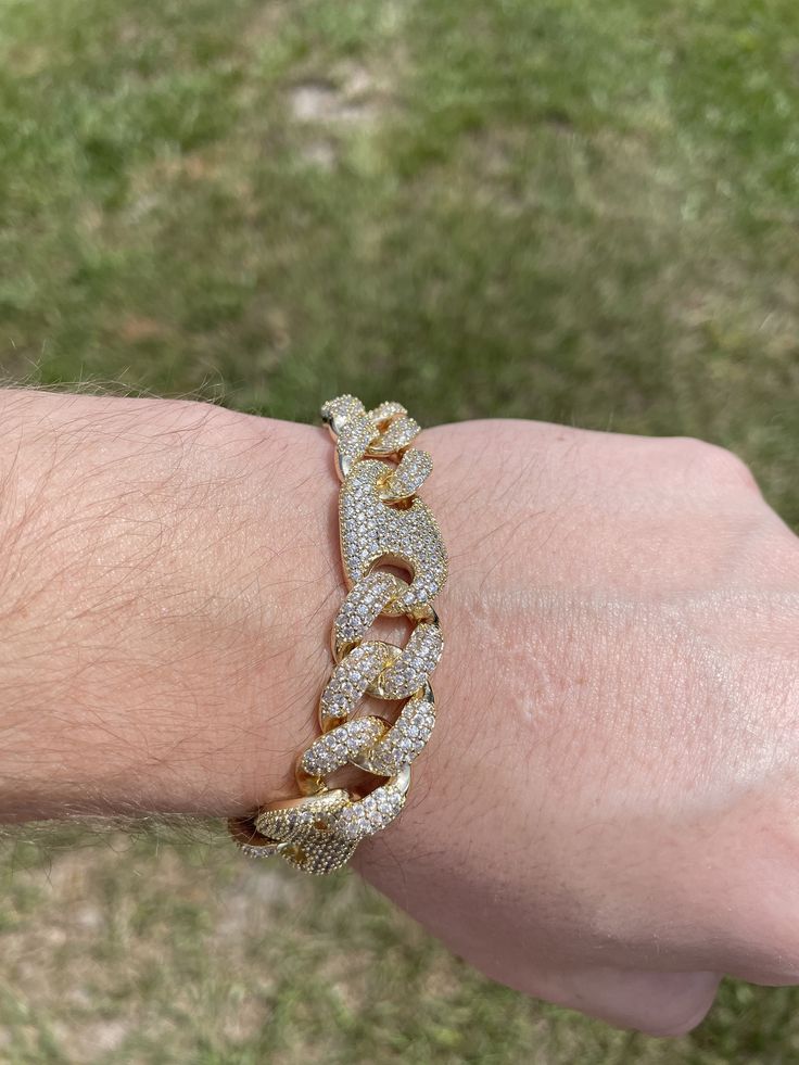 FAST SHIPPING!*TRUSTED SELLER**2300+ TRANSACTIONS* -Will be shipped through USPS with First Class Mail that includes tracking so you'll get it quick! -Don't confuse this with those cheap low quality cuban links that have glued in stones. -Premium 14k white gold OR 14k yellow gold plated diamond figaro cuban link Bracelet! -Plating is PVD which is the highest quality. -Stones are high quality VVS simulated lab diamonds(CZ)! Hand prong set and not glued in like the cheap ones! -Very nice box clasp Diamond White Iced Out Cuban Link Bracelets, Iced Out Diamond White Cuban Link Bracelets, Dazzling Iced Out Cuban Link Jewelry, White Diamond Cuban Link Bracelets, 14k White Gold Cuban Link Bracelet, Iced Out Yellow Gold Bracelet, Gold Cuban Link Tennis Bracelet With Diamond Accents, Gold Diamond Cut Cuban Link Bracelet, Gold Tennis Bracelet With Diamond Accents And Cuban Link