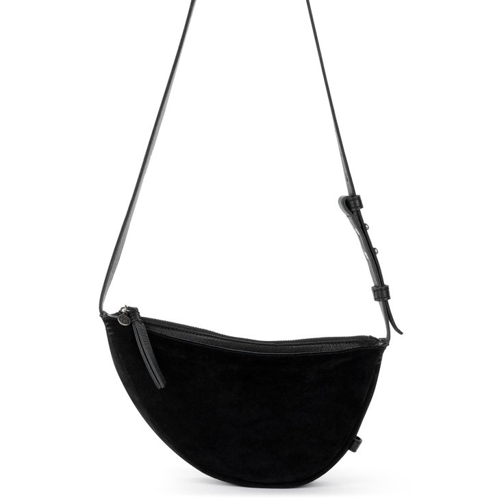 The Sak Tess Sling Bag  - |Suede - Black Suede| Sling Bag Black, The Sak, Functional Design, Sling Bag, Plastic Bottles, Belt Bag, Black Suede, Zipper Pocket, Adjustable Straps