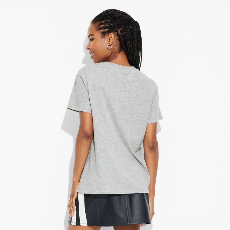 Stay comfortably casual with the Women's Dr Pepper Short Sleeve Graphic T-Shirt from Heather Gray. Made from a comfortable blend of cotton and polyester, this midweight fabric tee offers a classic fit with short sleeves and a crewneck. Perfect for casual outings or lounging at home, this graphic t-shirt combines comfort and style effortlessly. Athleisure T-shirt With Letter Print, Athletic Heather Short Sleeve Athleisure Top, Athletic Heather Short Sleeve Tops For Athleisure, Sporty Cotton T-shirt With Comfortable Fit, Sporty Graphic Print Tops, Heather Grey Cotton Short Sleeve T-shirt, Casual Heather Grey Pre-shrunk T-shirt, Solid Color Cotton T-shirt For Athleisure, Solid Cotton Athleisure T-shirt