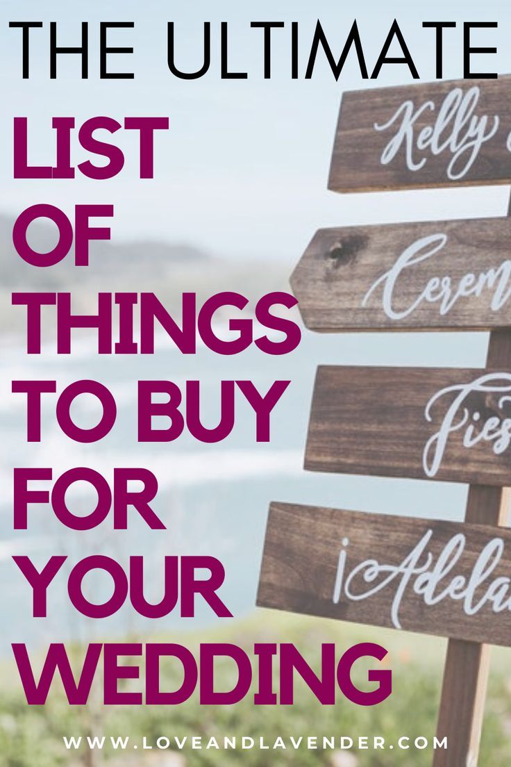 wooden signs that say the ultimate list of things to buy for your wedding with text overlay