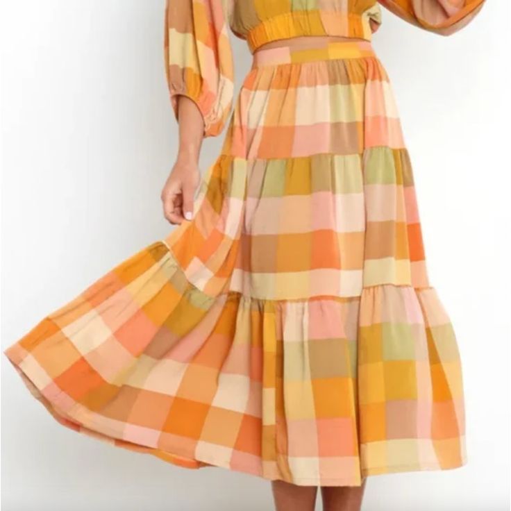 Detail: Nazzano Plaid Skirt -Checkered Print -Orange, Green, Beige Fall Colors -Tiered, Gathered Fabric -Zip Closure -Midi Length -Retails $59 Material: 100% Polyester Brand: Petal & Pup Condition: Brand New With Tags, No Flaws Or Stains From A Smoke-Free, Cat Friendly Home! Midi Tiered Skirt, Plaid Tiered Skirt, Orange Ruffled Skirt For Summer, Summer Orange Maxi Skirt With Elastic Waistband, Summer Orange Ruffled Skirt, Orange Tiered Skirt For Spring, Orange Flared Skirt For Spring, Orange Tiered Flowy Skirt, Orange Flowy Tiered Skirt