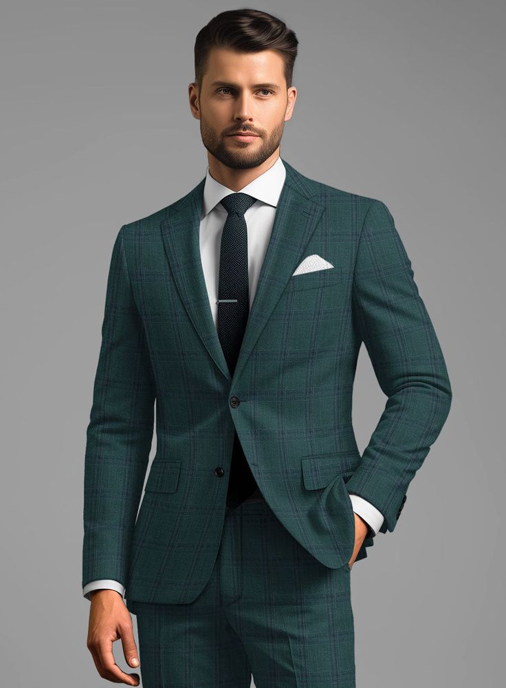 Maintain a stylish and trendy allure with our London Loom Green Check Wool Silk Linen Suit. Meticulously crafted from a sumptuous blend of wool, silk, and linen, it features a green hue with a subtle hint of blue plaid, radiating confidence and refinement. Tailored for the discerning gentleman who prioritizes both style and comfort, this suit is perfect for business meetings or weekend getaways. Experience a polished and sophisticated look without compromise.   The  London Loom Collection   masterfully blends the durability of wool, the luxury of silk, and the breathability of linen, reflecting the elegance of English tailoring. This fabric offers season-spanning comfort, refined drapes, and natural coolness. Woven with traditional expertise, it stands as a testament to quality, style, and Green Fitted Elegant Sets, Green Fitted Long Sleeve Suit, Elegant Green Business Casual Suits, Fitted Green Long Sleeve Suit, Elegant Green Sets With Suit Collar, Green Fitted Wool Suit, Fitted Green Wool Suit, Elegant Fitted Green Blazer, Green Fitted Sets