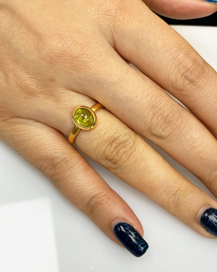 Natural Peridot Ring * Dainty Cabachon Ring * Genuine Peridot & 14K Solid Gold * Best Gift for Her/Him * Handmade Ring ◎ Details ◎ ○ Gemstone Details .Natural PERIDOT Oval Cut 9X7 mm approx. 2.01 ct ○ Gold Details 14K Solid Gold Width of Band : 2.50 mm Weight of Ring : approx 3.80 gr Made to Order HANDMADE ITEM ○ Upgrade to Solid 18K Gold, please click the link below: https://www.etsy.com/listing/962826004 For more CABACHON BEZEL rings : http://etsy.me/37fvI60 ○ PERIDOT RINGS : https://etsy. Round Gold Gemstones Fine Jewelry, Gold Sapphire Cabochon Ring, Yellow Gold Emerald Ring With Oval Cabochon Bezel Setting, Yellow Gold Emerald Ring With Bezel Setting, Yellow Gold Cabochon Ring, Gold Citrine Ring With Bezel Setting, Gold Citrine Rings With Bezel Setting, Gold Sapphire Ring With Oval Cabochon Bezel Setting, Gold Emerald Ring With Bezel Setting In Oval Shape