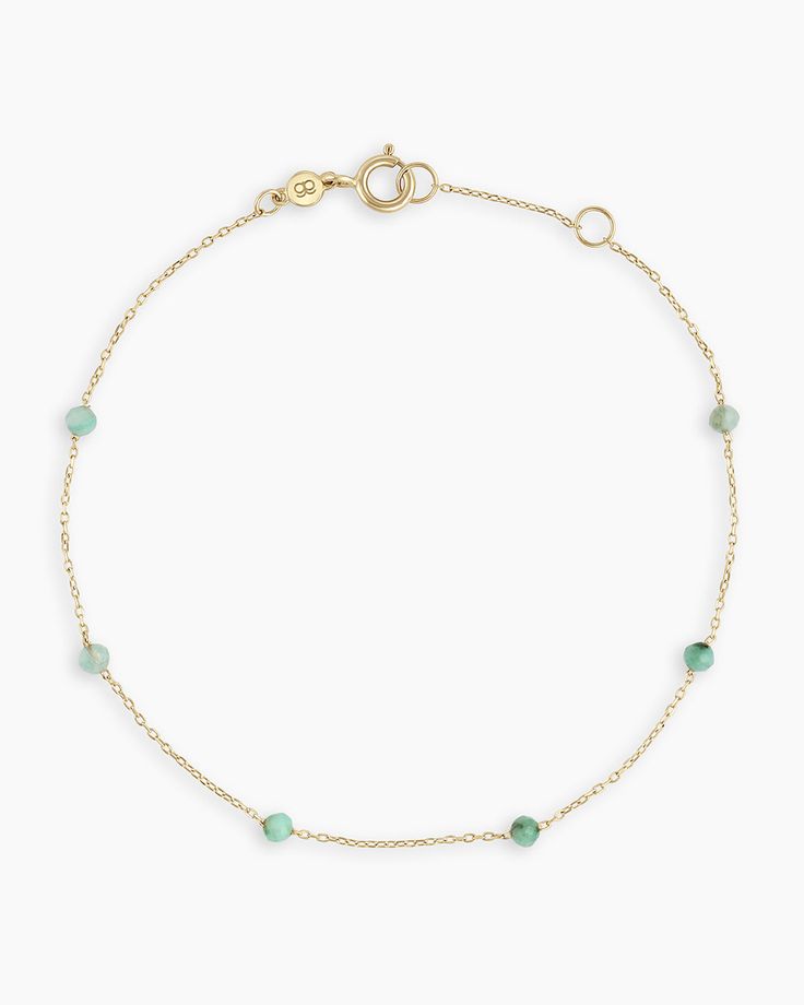 Whether you choose your favorite color or birthstone, the Emerald Newport Bracelet adds a beautiful pop of color to your bracelet stack. Crafted with genuine gemstones and 14k solid gold, this bracelet is both luxurious and timeless. Perfect for adding a touch of elegance to any look. Newport Birthstone Bracelet in 14k Solid Gold, Women's by gorjana Emerald Gold Bracelet, 14k Gold Bracelet With May Birthstone, Everyday Faceted 14k Gold Filled Bracelets, 14k Yellow Gold Bracelet With Gemstone, Yellow Gold Jewelry With Birthstone Round Beads, Dainty Gemstone 14k Gold Filled Bracelets, Yellow Gold Bracelet With May Birthstone Gemstone, Dainty 14k Gold-filled Bracelets With Gemstone Beads, Dainty Sterling Silver Gemstone Bead Bracelets