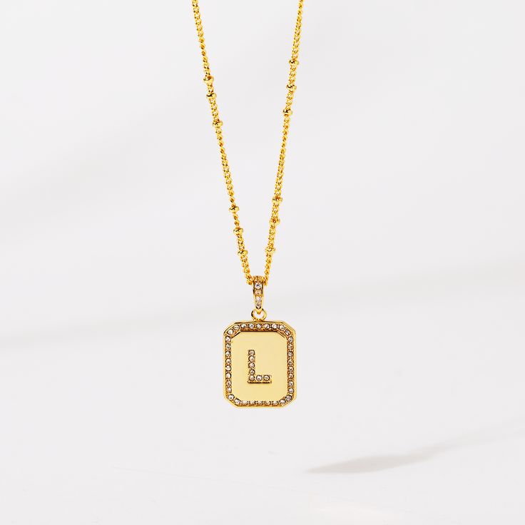 Timeless, elegant, and classy - our gold initial pendant necklace gives a personal touch to any outfit. This 18-20" personalized necklace features a gold pendant with an initial that is framed by shimmering crystals and the empowering message “I am Beautiful, Resilient, Strong, Enough, Loved ”is delicately engraved on the back. Tough days don't stand a chance against your inner fire! Wear this gold initial necklace to remind yourself that you are beautiful, loved, enough, strong, and resilient t Gold Initial Pendant, Gold Initial Necklace, Origami Owl Jewelry, Gold Embellishment, I Am Beautiful, Initial Necklace Gold, Initial Pendant Necklace, Tough Day, Gold Initial