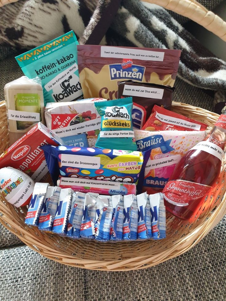 a wicker basket filled with snacks and condiments