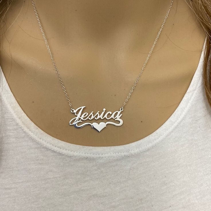 Description: 925 Sterling Silver Name Plate Heart Necklace - Jessica Item No.: C01 Metal Type: .925 Sterling Silver With Stamped 925 Finish: High Polish Measurement: 16" - 18 Inches. Pendant: 1.5" X 0.75" Brand New With Box Stamped 925 Necklaces For Mother's Day, Stamped 925 Silver Necklaces For Mother's Day, Sterling Silver Name Necklace As A Gift For Her, Silver Heart Pendant Name Necklace As Gift For Her, Personalized Sterling Silver Necklace With Heart Pendant, Sterling Silver Heart Pendant Necklace For Personalized Gift, Dainty Silver Name Necklace For Valentine's Day, Silver Dainty Heart Necklace For Personalized Gift, Dainty Silver Heart Necklace For Personalized Gift