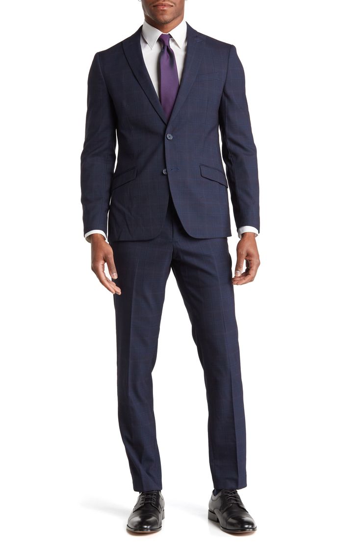 A tonal plaid pattern defines a modern suit that features flat front trousers and a two-button jacket framed with crisp peak lapels. Jacket: 31" length; trousers: 13" rise, 31" inseam (size 40R) Jacket has button cuffs, chest pocket, front welt pockets, button front Trousers have zip front with hook-and-bar closure, front pockets, back pockets Fabric: 80% polyester, 18% rayon, 2% spandex; lining: 100% polyester Dry clean Imported Model stats: 6'1" height, 32" waist. Model is wearing size 40R. Plaid Single Breasted Suits For Business Casual, Plaid Suits With Welt Pockets For Business, Semi-formal Plaid Suit With Notch Lapel, Business Plaid Suit With Suit Collar, Plaid Business Suit With Suit Collar, Formal Plaid Suits With Notch Lapel, Plaid Suits With Welt Pockets And Suit Collar, Plaid Notch Lapel Suit For Formal Occasions, Plaid Notch Lapel Suit For Business Casual