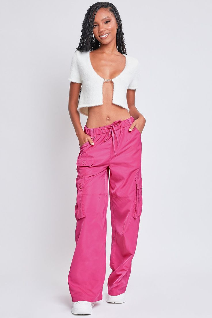 Every day is a new chance to wear our Women’s Relaxed Fit Cargo Pants. This high-waisted nylon pant features a relaxed fit for both style and comfort, ensuring you’ll look good and feel good throughout the day. Includes classic front pockets, three cargo pockets with button closures, and faux back pockets for maintaining a smoothing effect on your bum. These trendy pants are detailed with metal d-rings on the front belt loops and a drawstring waist so you can adjust the fit to your liking. Style Ymi Jeans, Trendy Pants, Nylon Pants, Pink Friday, Mom Shorts, Lounge Shorts, Elastic Waist Shorts, Women Lifestyle, Jogger Shorts