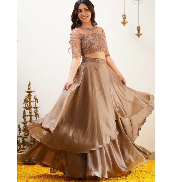 lehenga set  |womens lehenga choli |crop top lehenga set |designer lehenga dupatta | wedding lehenga choli | lehenga usa Women's lehenga set /sequin embroidery silk lehenga skirt/voggish/ chalcolate brown heavy lehenga /teens lehenga      lehengas are one of the beautiful and versatile traditional attires of india !! we carry such pieces in budget with great quality that can be styled in multiple ways with different outfits !!       Here is simple and Beautiful pure satin lehenga  skirt in doubl Festive Anarkali Embellished Skirt, Festive Floor-length Embellished Skirt, Embellished Floor-length Festive Skirt, Festive Embellished Long Skirt, Designer Festive Tiered Skirt Lehenga, Fitted Tiered Skirt Choli For Navratri, Designer Festive Lehenga With Tiered Skirt, Designer Festive Tiered Lehenga, Anarkali Choli With Georgette Tiered Skirt