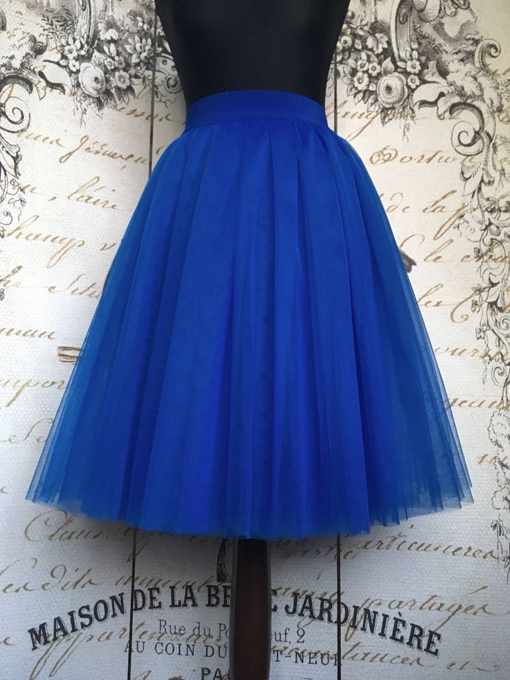 "Beautiful tulle skirt from soft Italian tulle for every day or special occasion. All skirts are made from 4-6 layers tulle, soft lining and elastic waistband for perfect fit and comfort. Each item are handmade and excelent quality. Usually tulle skirt sewing takes about 1 week. Shipping to US - 10 till 14 days, to UK - 5 till 7 days. If you need skirt for a specific date, please write it in the order notes. The model is 5.6ft tall and wears 26\" skirt length (6 layers). The length of the skirt Blue Long Tulle Skirt, Blue Tulle Long Skirt, Blue Full Tulle Skirt, Blue Long Tulle Skirt Dresses, Blue Long Tulle Dress, Blue Tiered Tulle Skirt, Blue Tiered Tulle Skirt Dresses, Blue Tulle Skirt For Summer, Blue Flared Tulle Skirt