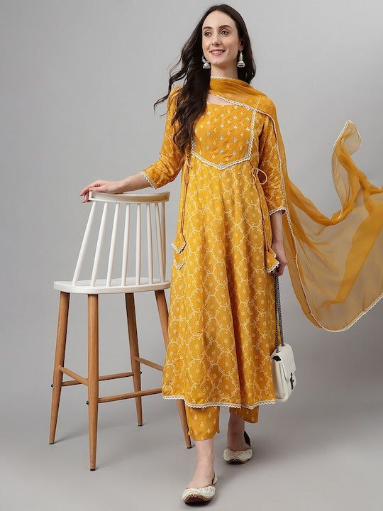 PRODUCT DETAILS Yellow and white kurta with palazzos & dupatta Kurta design: Ethnic motifs printed Anarkali shape Paneled style Round neck, three-quarter regular sleeves Sequined Calf length with flared hem Viscose rayon machine weave fabric Palazzos design: Printed palazzos Elasticated waistband Slip-on closure Size & Fit The model (height 5'8) is wearing a size SDupatta length 2.10 meter and width 0.88 meter Please check the last image above for a complete size chart. Material & Care Kurta: Vi White Mulmul Sharara With Printed Motifs, Mulmul Palazzo Set With Sheer Dupatta, Straight Kurta Palazzo Set With Sheer Dupatta In Mulmul, Mulmul Palazzo Set With Sheer Dupatta And Straight Kurta, Ankle-length Printed Motifs Salwar Kameez, Ankle-length Palazzo Set With Resham Embroidery For Eid, Palazzo Set With Sheer Dupatta And Straight Kurta, Eid Sharara With Dupatta Ankle-length, Eid Ankle-length Sharara With Dupatta