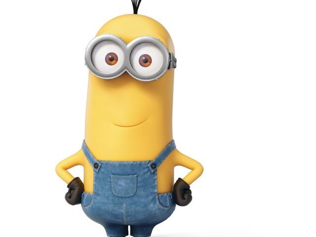 a minion with glasses and overalls standing in front of a white background