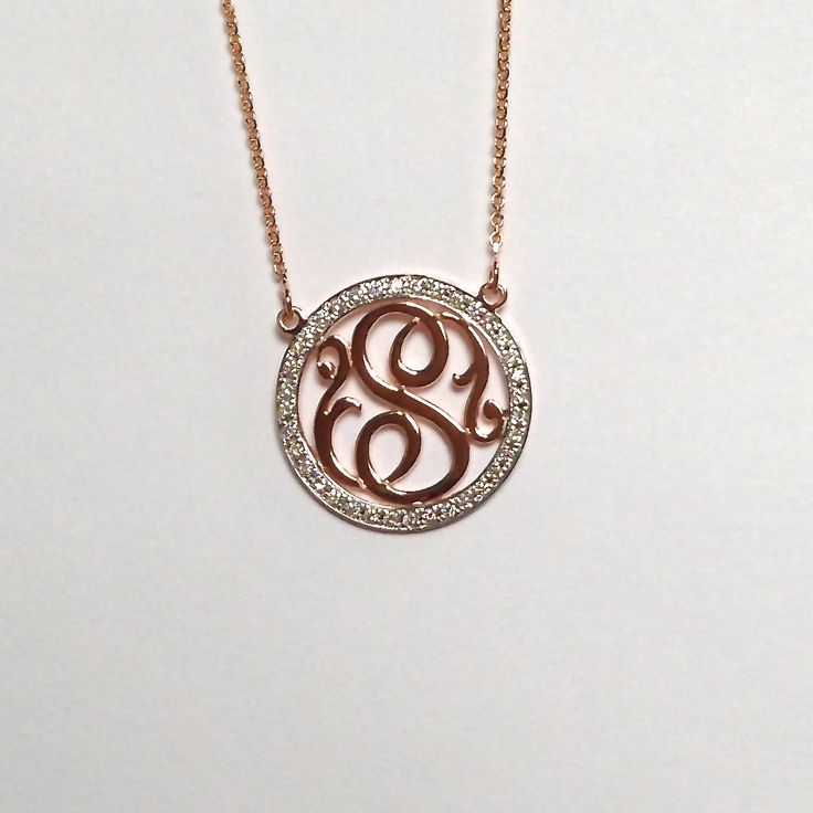 "The outer circle measures 0.75\" in diameter and is covered with beautiful F-G color, VS2-SI1 clarity diamonds. The outline is covered with approximately 40 brilliant, full-cut, round diamonds with a weight of 0.50 ct. In this absolutely stunning necklace, a diamond covered outline frames a gorgeous script single initial. Also, the 14k gold plate is significantly thicker and heavier than the plate used for our traditional monograms. This is necessary to accommodate the diamonds. This necklace c Monogram Diamond Fine Jewelry, Fine Jewelry Diamond Monogram, Luxury Rose Gold Monogram Jewelry, Initial Diamond Necklaces, Diamond Initial Necklaces, Round Diamond Initial Necklaces, Diamond Monogram Jewelry For Anniversary, Fine Jewelry Diamond Necklace With Initials, Fine Jewelry Round Diamond Necklace With Initials