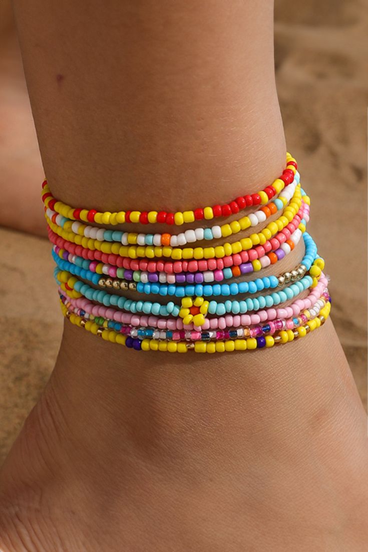 This multi-layered beaded anklet set features a beautiful yellow flower design with random color beads. Each layer adds depth and charm, making it the perfect accessory for any summer outfit. Handcrafted with precision and attention to detail, this anklet set is sure to make a statement. Beaded Anklet, Ankle Jewelry, Tiny Beads, Bohemian Aesthetic, Bright Eye, Color Beads, Next Fashion, Layered Design, Yellow Pattern