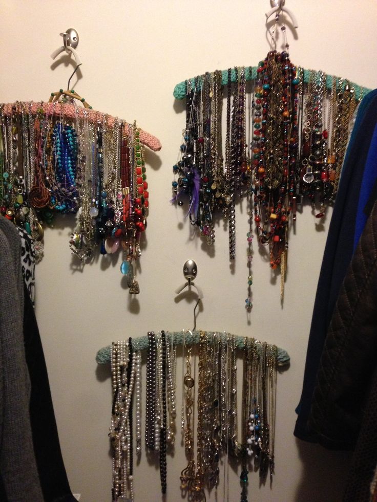 there are many bracelets hanging on the wall