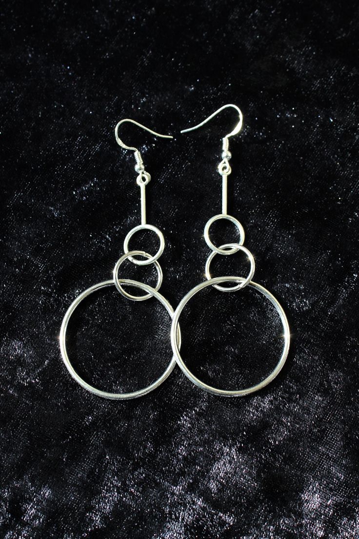 "Simple, modern and pretty lightweight for their size, these earrings will still make a statement and create a lot of movement around your face. You'll get to select your preferred ear wire type and a style variation. I offer sterling silver and non-precocious metal ear wires, which is reflected in the price. The last photo will help you figure out the type you want.  The style variation is very subtle. Pick the mirror polished \"smooth\" option if you are an elegant minimalist, or the \"texture Minimalist Metal Linear Earrings, Modern Silver Hoop Earrings For Party, Minimalist Silver Linear Earrings For Pierced Ears, Modern Metal Linear Earrings For Everyday Wear, Modern Metal Linear Earrings For Everyday, Trendy Sterling Silver Jewelry With Simple Design, Trendy Silver Jewelry With Simple Design, Modern Nickel Free Jewelry For Party, Modern Nickel-free Jewelry For Party