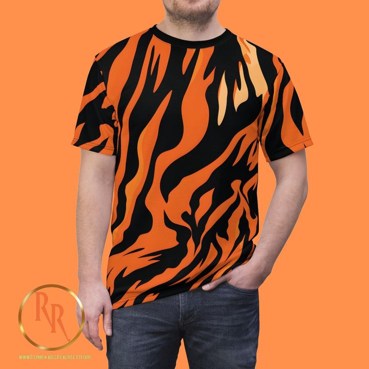 Tiger All Over Print Polyester Tee | Nature Lover Gift Idea | Big Cat Animal Print Shirt Unleash your wild side with this striking Tiger All Over Print Polyester Tee! This bold, nature-inspired tee features a stunning full-body tiger design, perfect for jungle cat lovers and anyone who appreciates the beauty of wildlife. Crafted from high-quality polyester, this shirt not only delivers vibrant, fade-resistant colors but is also lightweight, breathable, and super comfortable--ideal for everyday w Cat Tee Shirts, Jungle Cat, Animal Print Shirts, Tiger Design, Cat Tee, Big Cat, Tiger Print, Print Tee, Gifts For Nature Lovers