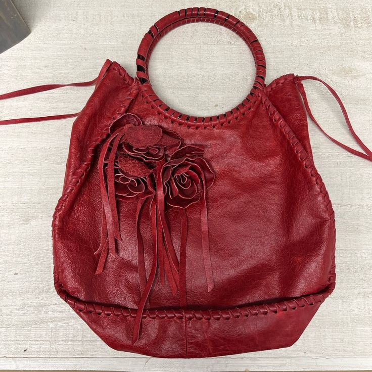 Beautiful Red Leather Bag, Medium Size, Never Worn, Not Sure What Brand It Is, Doesn’t Have Any Tags. Has A Zip Pocket Inside. Beautiful Stitching All Around. Faux Horn Handles Wrapped In Leather. Red Leather Bag, Womens Tote Bags, Lady In Red, Medium Size, Inside Pocket, Red Leather, Horn, Leather Bag, Style Me