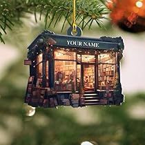 an ornament hanging from a christmas tree with the words your name on it