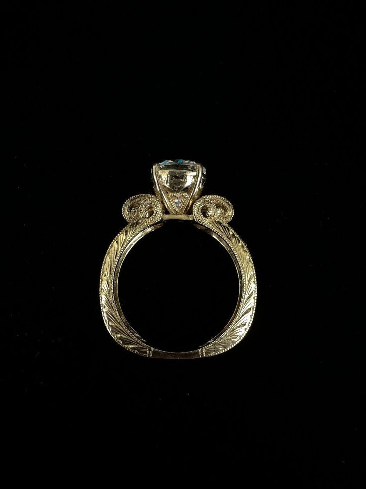 Vintage Victorian Revival Sterling Gold Plated Round Cut CZ Large Ring Sz 9.5 Item here is a vintage Victorian Revival sterling silver gold plated round cut cubic zirconia large ring. This ring is marked sterling silver. This ring has a very unique design and a large beautiful cubic zirconia stone. Made with a high quality cast and design. Condition: Great; item is pre-owned and may have some signs of light use and age related wear. Please look closely at the pictures provided as they are an extension of our written description. Measurements: Size: 9.5 Band Width: 4mm Stone: 8.8mm Weight: 6.2g 8643F Collectible Diamond Ring With Brilliant Cut, Brilliant Cut Diamond Ring For Collectors, Luxury Round Topaz Ring With Diamond Accents, Luxury Engraved Ring With Vs Clarity, Classic Yellow Gold Topaz Ring With Diamond Accents, Collectible 14k Gold Diamond Ring, Classic Diamond Engraved Ring With Vs Clarity, Collectible Brilliant Cut Round Rings, Victorian Style Gold Rings With Brilliant Cut