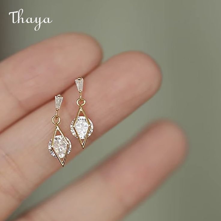 Elevate your style with Thaya's Sterling Silver Earrings, featuring gemstones and diamond accents. Crafted from high-quality 925 silver or 14k gold plated, these earrings are perfect for any woman who loves elegant and sophisticated jewelry. The diamonds add a touch of sparkle, while the inlay material of sterling silver and gemstones enhances their durability and beauty. With a weight of just 1.5g, these earrings are comfortable for everyday wear. The process of diamonds ensures their quality a Teardrop Bridal Earrings, Stud Earrings Women, Earrings Women, Party Jewelry, Gold Earrings Dangle, Dream Jewelry, Ear Jewelry, 925 Sterling Silver Earrings, Pretty Jewellery