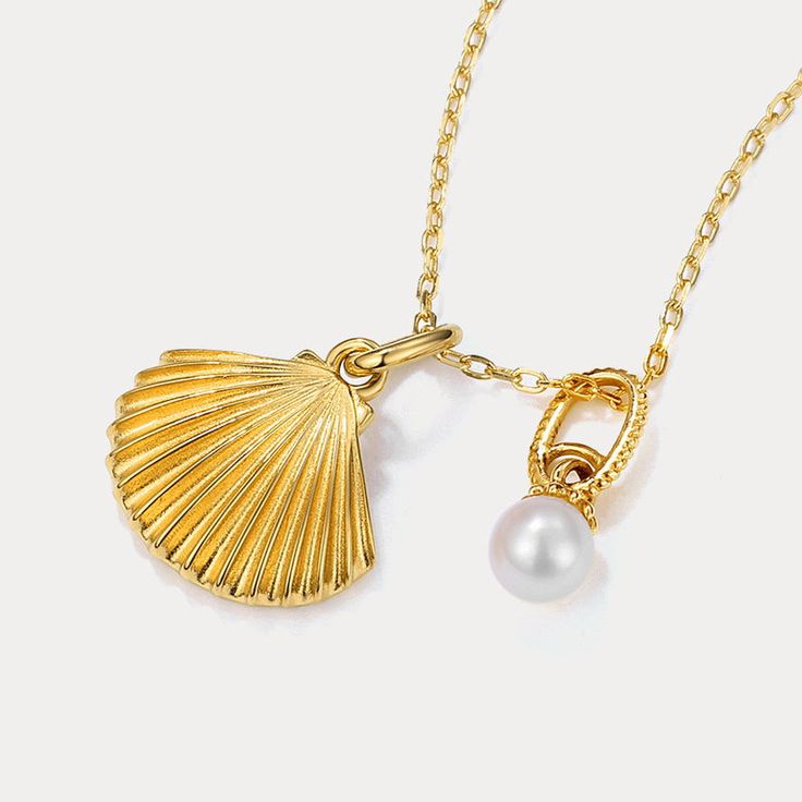 This delicate pearl and gold shell pendant necklace speaks volumes on sustainable style.  Featuring a genuine freshwater pearl nestled within a 9k gold-plated shell, this dainty necklace captures the ocean's essence in an eco-friendly design. Perfect for the conscious consumer, this necklace adds a touch of delicate charm and aquatic inspiration to any outfit. 🌊 DETAILS Plating: 9K Gold  Materials: 9K Gold on Silver, Freshwater Pearl Measurements: Length: 15.75 "(40cm) + Extender: 1.97"(5cm) Pendant Size: 0.47"*0.71"(1.2cm*1.8cm) Weight: 3.1 g Shell-shaped Pearl Charm Necklace, Shell Necklace With Pearl Pendant, Elegant Pearl Charm Shell Necklace, Elegant Shell Pearl Necklace With Pearl Charm, Elegant Pearl Chain Necklace Made Of Shell, Elegant Shell-shaped Necklace With Pearl Charm, Elegant Pearl Necklace With Shell And Pearl Charm, Elegant Shell Pearl Chain Necklace, Elegant Gold Shell Necklace With Pearl Charm