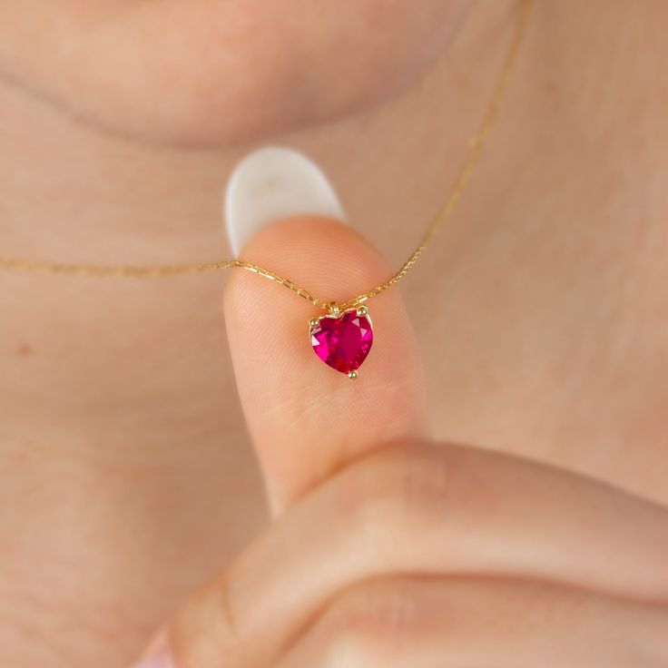 "Ruby, the harbinger of love, is a symbol of passion and desire. Ruby is the biggest representation of your love for your lover with its red fire color. Ruby is the birthstone for those born in July. Love is the shortest distance between two hearts. Let's meet this distance with our heart necklace. Other Products Compatible with Our Ruby Heart Necklace: https://artdiamonds.etsy.com/listing/1540105930/14k-solid-gold-ruby-heart-earringsjuly?utm_source=Copy&utm_medium=ListingManager&utm_campaign=Share&utm_term=so.lmsm&share_time=1693231369479 https://artdiamonds.etsy.com/listing/1554296559/heart-ruby-ring14k-solid-gold-ring?utm_source=Copy&utm_medium=ListingManager&utm_campaign=Share&utm_term=so.lmsm&share_time=1693231585982 Ruby Heart Necklace,14K Solid Gold Heart Necklace,Valentines Day Gif 14k Gold Heart Necklace With Gemstone, Fine Jewelry 14k Gold Heart Necklace With Birthstone, Valentine's Day Yellow Gold Gemstone Heart Necklace, Valentine's Day Yellow Gold Heart Gemstone Necklace, Valentine's Day Birthstone Heart Necklace In Fine Jewelry, Valentine's Day Fine Jewelry Heart Necklace With Birthstone, 14k Gold Gemstone Heart Necklace For Valentine's Day, Heart-shaped Yellow Gold Birthstone Necklace For Valentine's Day, Heart-shaped Birthstone Necklace As Gift For Her