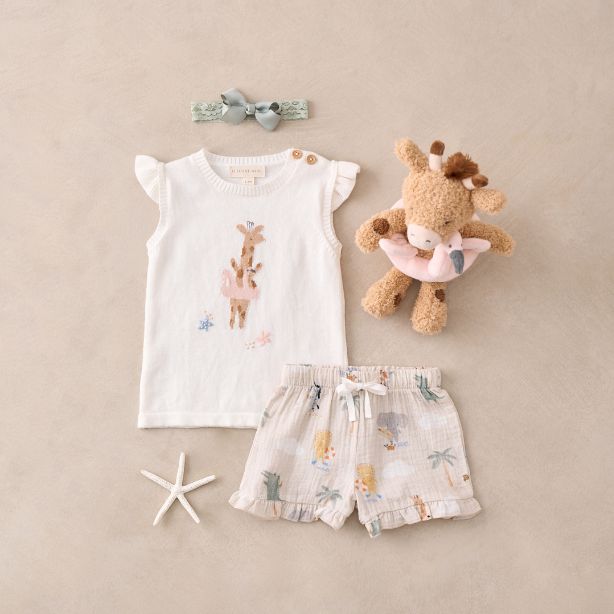 Good for baby, good for the environment. Our organic, naturally sustainable muslin is soft and breathable, ideal for outdoor adventures during the spring and summertime. Cast in a dreamy palette, this knit tee + muslin short set combines fashion and function for the modern child. Wooden buttons add an extra dash of style to this already stunning organic baby set. Top: 100% cotton knit Bottom: 100% organic cotton muslin, GOTS certified Wood buttons Top: Machine wash delicate/gentle, Do not bleach Beige Tops For Summer Playwear, Cream Summer Playtime Top, Cream Summer Tops For Playtime, Summer Cream Tops For Playwear, Cream Summer Tops For Playwear, Cream Tops For Playwear In Summer, Cream Tops For Summer Playwear, Dreamy Palette, Elegant Baby