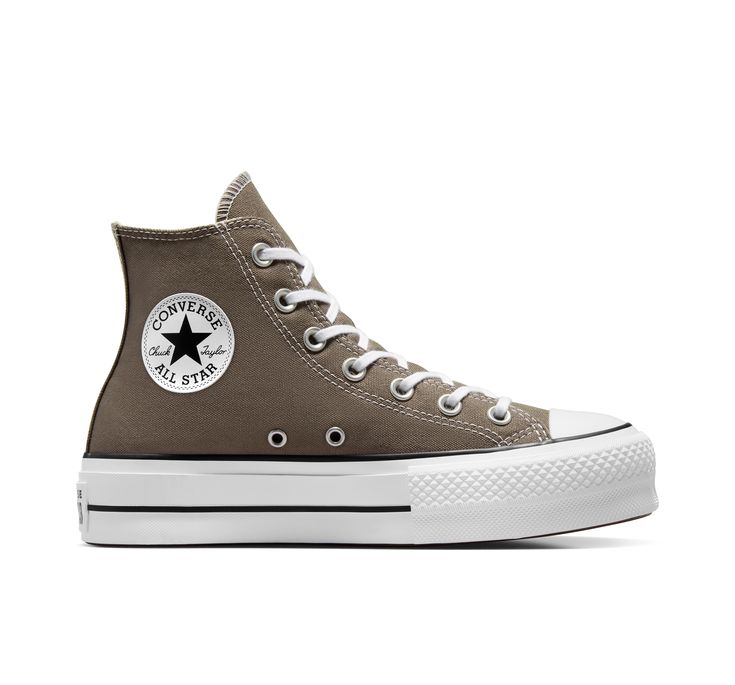 Classic Chucks, leveled up. The Chuck Taylor All Star has morphed since its creation in 1917. Still, despite the everchanging landscape of fashion and decades’ worth of trends, the everyday icon lives on. A simple design, a timeless silhouette, an unmistakable ankle patch— something familiar for every iteration of you, no matter where your style might lead you next. Converse Chuck Taylor All Star Lift Platform Canvas For Women In Grey, Size 9 Cute Shoes Converse, Brown Platform Converse, Costume Converse, Fall Converse, Tan Converse, Cute Converse Shoes, Brown Converse, Platform Chucks, Christmas Lists