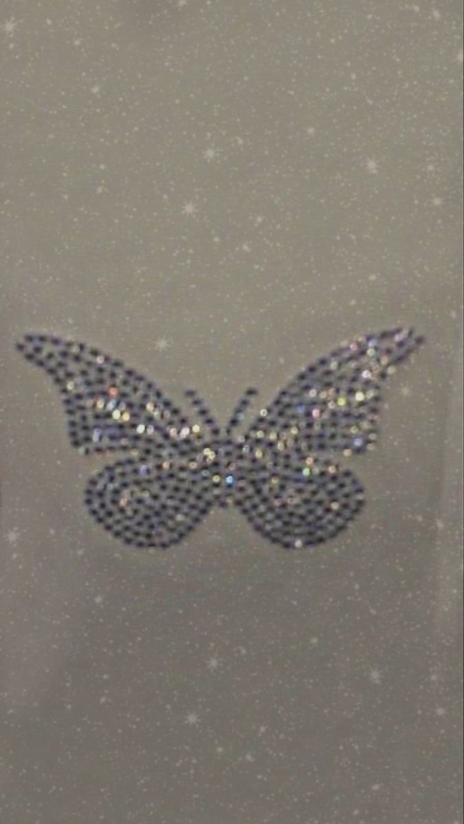 an image of a butterfly made out of sequins