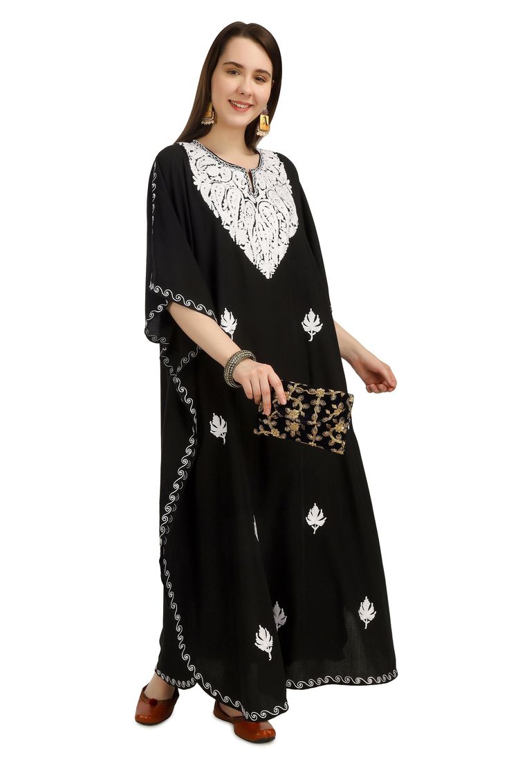 Kashmiri Aari Embroidered Cotton Kaftan.A Stunningly Marvellous Kaftan.This Kaftan Is Made Of Cotton Its Embroidered  With White Colour.Breezy Cotton Bohemian Maxi Dresses Or Caftans Are The Perfect Style Statement For Summer, Spring Days, Beach Holidays.The Embroidery Done On This Is A Traditional Kashmiri Embroidery Known As 'Aari Work''. Product Details - Condition: Brand New - Handmade - Style: Kaftan - Fabric: soft Cotton - Embroidery: Kashmiri Aari Embroidery - Length: 54'' Inch - Chest: 6 Georgette Kaftan With Resham Embroidery, Floor-length Resham Embroidered Kaftan For Diwali, Diwali Floor-length Kaftan With Resham Embroidery, Eid Dabka Embroidered Georgette Kaftan, Eid Dabka Embellished Georgette Kaftan, Diwali Georgette Kaftan With Resham Embroidery, Festive Maxi Kaftan With Resham Embroidery, Eid Floral Embroidered Kaftan, Embroidered Georgette Kaftan For Summer