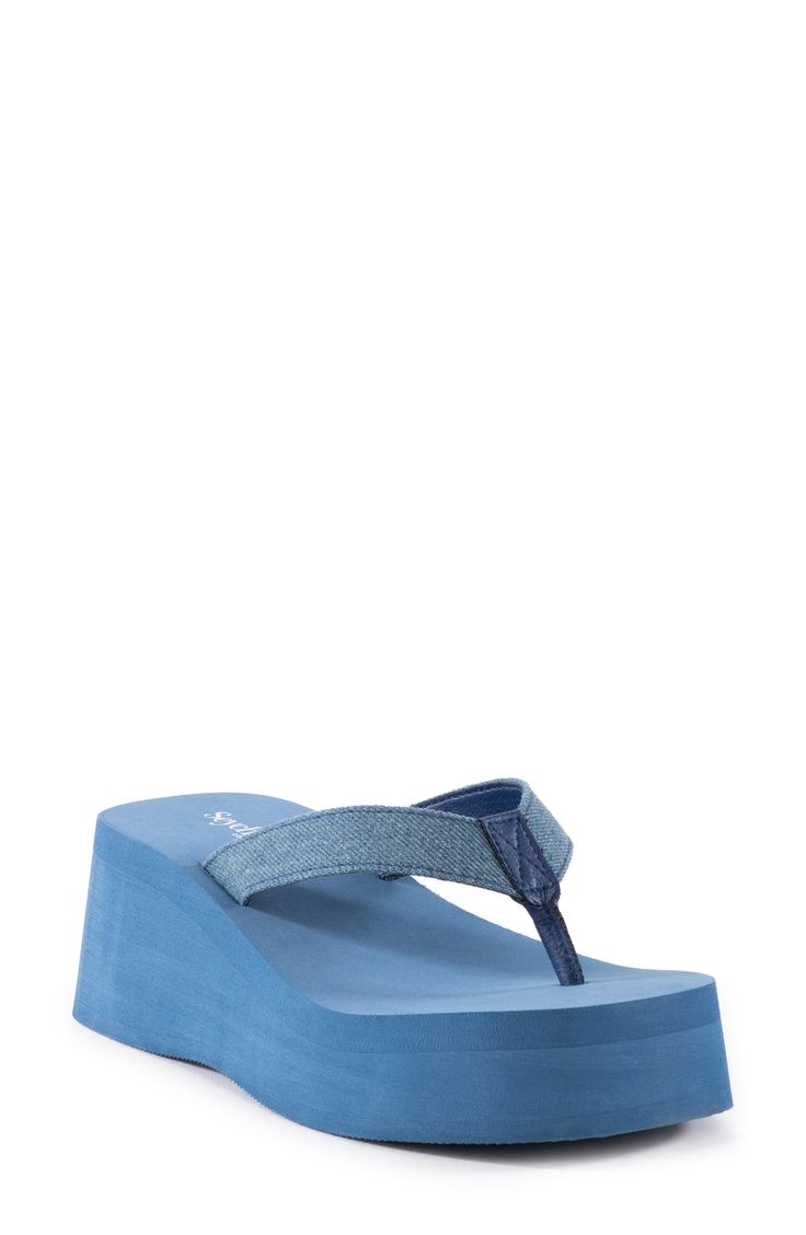 Wide straps and a cushioned footbed bring breezy comfort to this on-trend flip-flop set on a chunky platform. 2 1/4" heel; 1 1/2" platform Textile or synthetic upper/synthetic lining and sole Imported Casual Blue Platform Slippers For Summer, Comfortable Blue Synthetic Wedge Sandals, Blue Synthetic Platform Slippers For Summer, Blue Round Toe Eva Flip Flops, Summer Foam Flip Flops With Round Toe, Synthetic Platform Slippers With Arch Support For Beach, Spring Pool Sandals With Synthetic Material, Synthetic Toe Post Platform Slippers With Textured Footbed, Spring Pool Synthetic Flip Flops