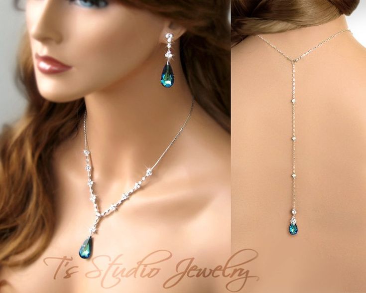 Thank you for visiting my collection of handmade bridal jewelry on Etsy. For more wedding jewelry and accessories, please visit my other website at www.tstudiojewelry.com MARISSA Peacock Blue Back Drop Lariat Bridal Necklace & Earrings Set What a statement this necklace and earrings set makes! It is truly stunning, perfect for that low back wedding gown.  This classic necklace is designed with cubic zirconia stones set in silver, and peacock bermuda blue colored Swarovski crystal pendant drops. Perfect for a wedding or special occasion. Back drop is a combination of silver chain and round cubic zirconia stones, with a blue teardrop Swarovski crystal. Swarovski crystal stones available in several colors. If you would like this necklace customized, please contact me. IF YOU NEED YOUR JEWELRY Low Back Wedding Gowns, Wedding Jewelry And Accessories, Blue Bridal, Back Drop, Wedding Accessories Jewelry, Classic Necklace, Bridal Bracelet, Necklace And Earring Set, Peacock Blue