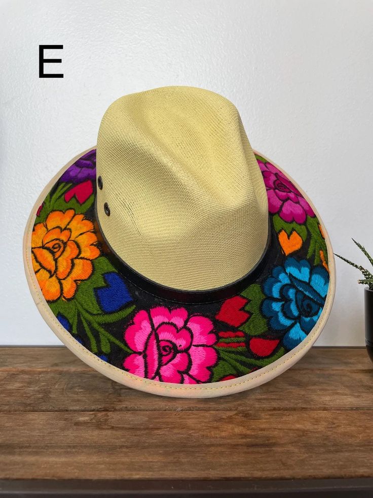 Medium Size Our hats are stylish and is completely unique in design, perfect to add that special touch to any outfit. Multicolor Spring Visor Hat, Summer Embroidered Short Brim Hat, Embroidered Summer Hat With Short Brim, Multicolor Flat Brim Panama Hat, Multicolor Flat Brim Fedora, Multicolor Visor Hat For Vacation, Casual Wide Brim Hats With Embroidery, Casual Wide Brim Embroidered Hats, Beach Hats With Floral Embroidery And Wide Brim