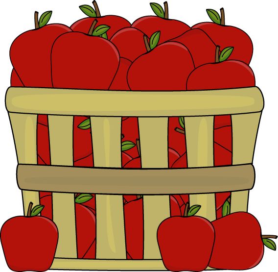 a basket full of apples with leaves around it