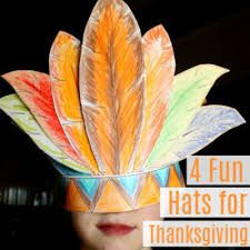 a child wearing a paper hat with leaves on it and the words 4 fun hats for thanksgiving