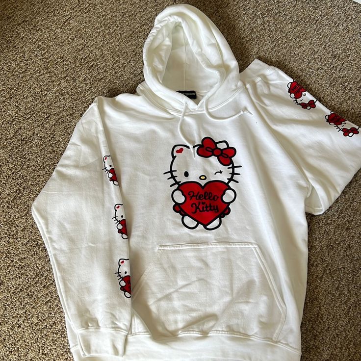 New Girl Order Hello Kitty Hoodie Size 10 Never Worn White Hooded Hoodie With Cartoon Print, White Hoodie With Cartoon Print, Casual Hello Kitty Hooded Sweatshirt, Casual Hooded Hello Kitty Sweatshirt, Casual Hooded Sweatshirt With Hello Kitty Print, Hello Kitty Print Top For Winter Streetwear, White Casual Sweatshirt With Cat Design, Cute White Winter Hoodie, Casual White Sweatshirt With Cat Design