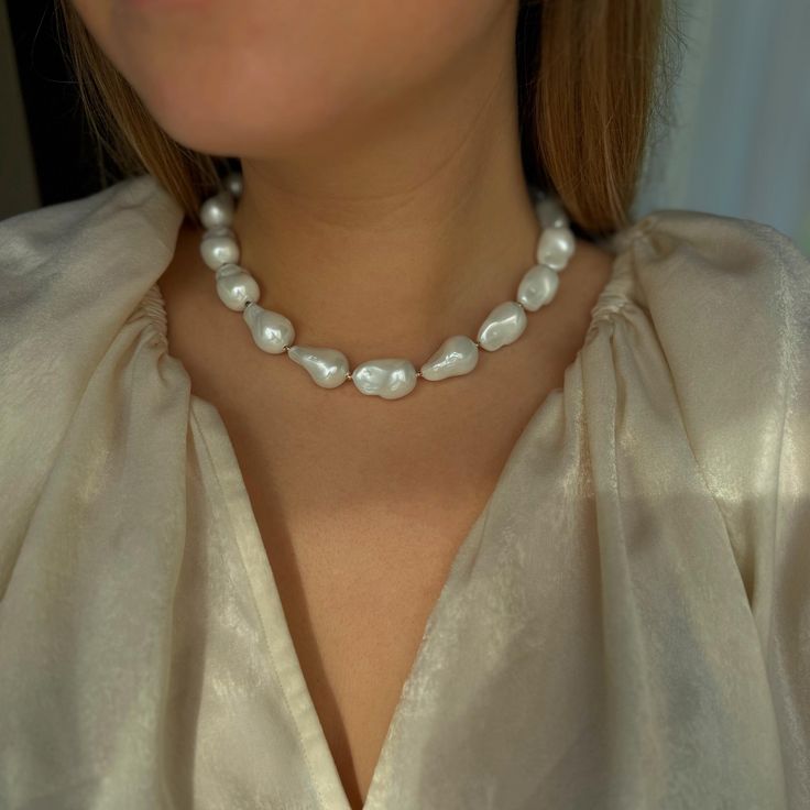 **Irregular Baroque Pearl Necklace | Baroque Pearl and Shell Choker** Make a bold statement with this **Irregular Baroque Pearl Necklace featuring stunning pearls crafted from a unique blend of shell and pearl mass. This chunky, large choker merges natural elegance with artistic design, perfect for those who love distinctive, ocean-inspired jewelry. **Key Features - **Irregular Baroque Pearl Necklace Showcasing uniquely shaped pearls, each one is crafted from a blend of shell and pearl mass, giv Chunky Pearl Necklace, Pearl Crafts, Ocean Inspired Jewelry, Choker Designs, Chunky Pearls, Shell Choker, Baroque Pearl Necklace, Necklace Pearl, Shell Necklace