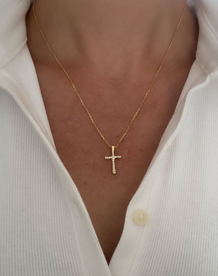 Gold Cross Necklace, Waterproof jewelry, Cross Necklace for women, gift for her, graduation gift, baptism gift, CZ cross necklace, birthday  Dainty Cross Necklace MADE TO LAST  * 14k gold filled Cross pendant 20mm x 12mm * Cubic Zirconia Stones * Stainless Steel chain - water resistant for long lasting wear *Chose your perfect length *Shown at 18" on a size Small model for reference Water & tarnish resistant!  Gold filled jewelry is durable & tarnish resistant.  Yes, you can get them wet! Filled Gift Cross Pendant Necklace With Clavicle Chain, Gift Cross Necklace With Clavicle Chain, Crucifix Cross Necklace With Clavicle Chain As Gift, Cross Necklace With Adjustable Chain Crucifix As Gift, Crucifix Cross Necklace With Adjustable Chain, Crucifix Cross Necklace With Adjustable Chain As Gift, Hypoallergenic Cross-shaped Jewelry For Gift, Hypoallergenic Cross-shaped Jewelry Gift, Hypoallergenic Cross Jewelry Gift