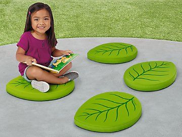 Comfy enough for indoor use�yet rugged enough for the outdoors! Featuring an inviting leaf design, our durable, all-weather floor seats provide the perfect spot for children to sit and relax. Set includes 4 dense foam seats, each with a fade- and water-resistant cover that removes for machine-washing. Seats measure 17 3/4" in length. Daycare Furniture Outdoor, Childrens Library Seating, Forest School Furniture, Daycare Tree, Lakeshore Learning, Sensory Room, Home Daycare, Flexible Seating, Classroom Furniture