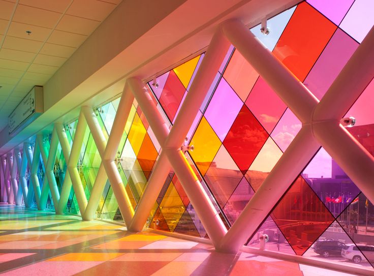 an abstract photo of colorful glass windows in a building