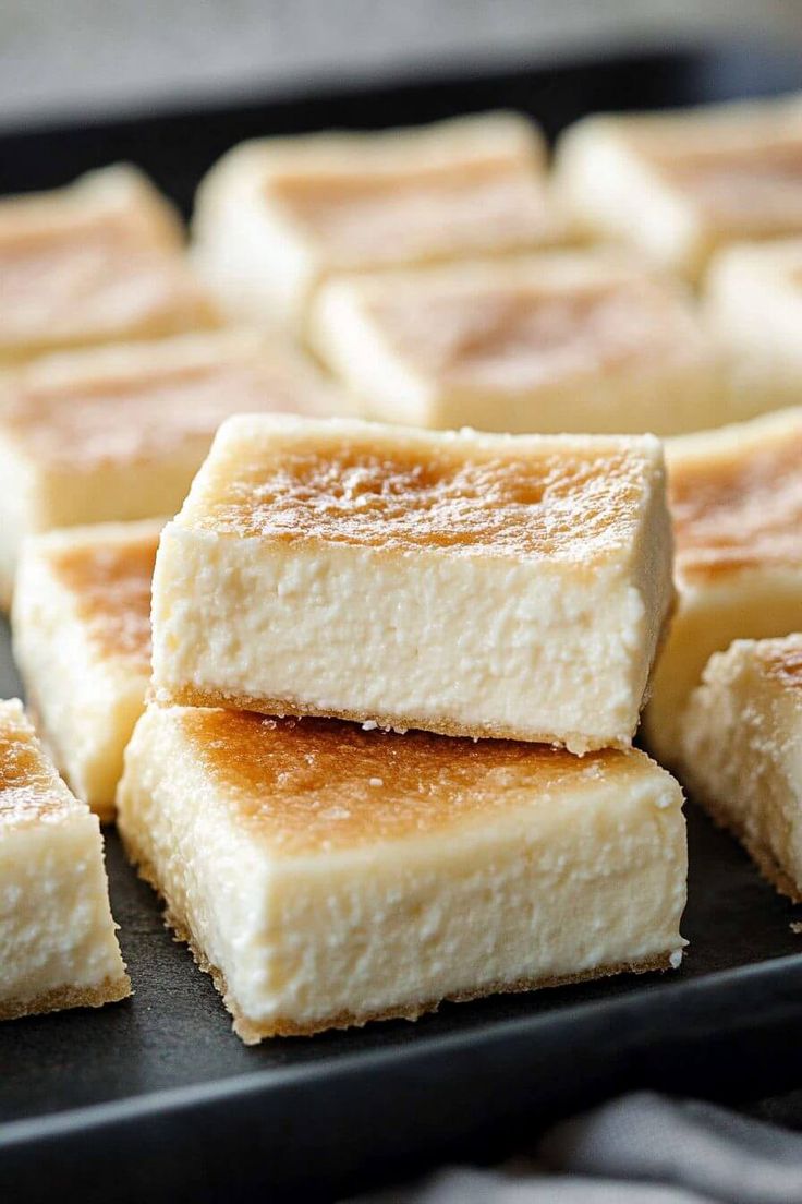 several pieces of cake sitting on top of a pan